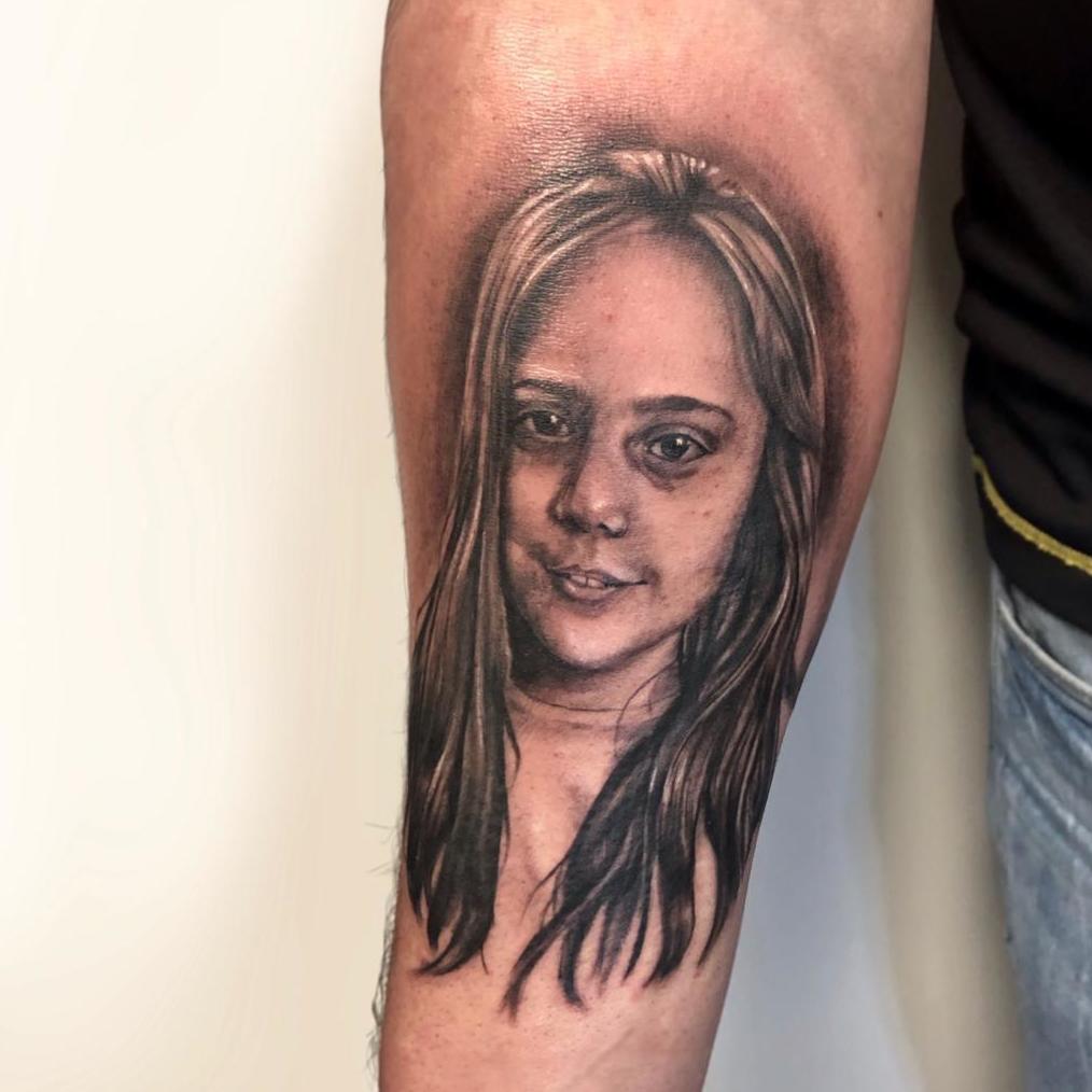 Tatuaje retrato en el antebrazo
