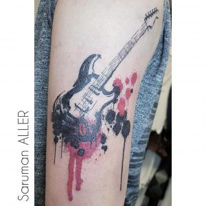 tatuaje guitarra electrica trash polka
