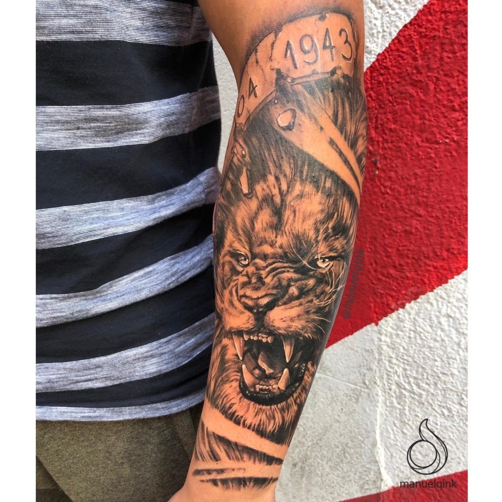Tatuaje de un león estilo realismo en el antebrazo