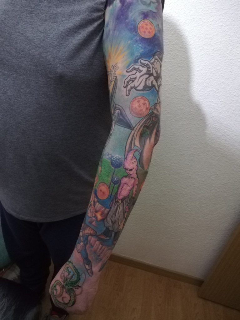 Goku tattoo estilo realismo a color en el brazo