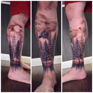 Tatuaje bosque en la pierna estilo realismo