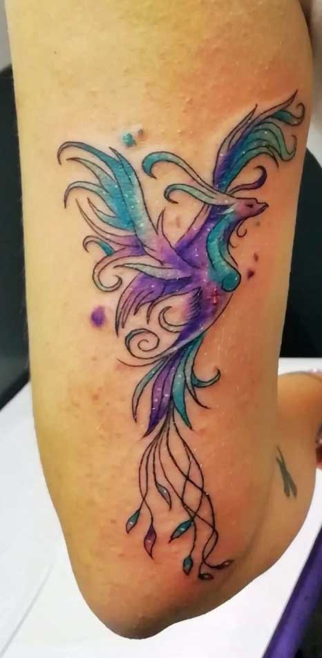 diseño tattoo en el brazo para chicas