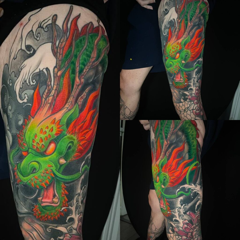 tatuaje manga anime a color dragón en la pierna
