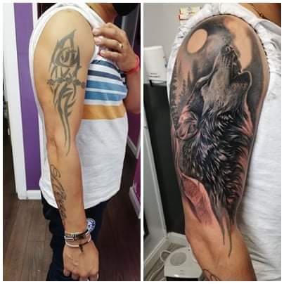 Howling wolf cover up tattoo on right arm