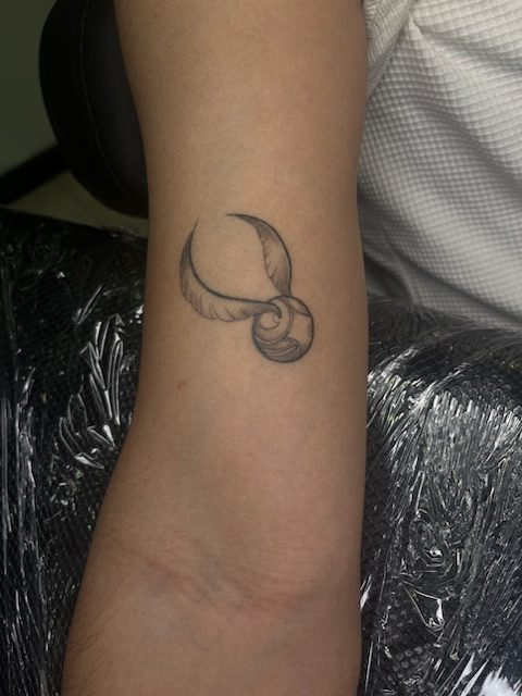 tatuaje snitch harry potter