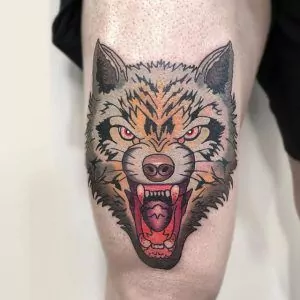 Tatuaje tigre estilo neotradicional en la pierna