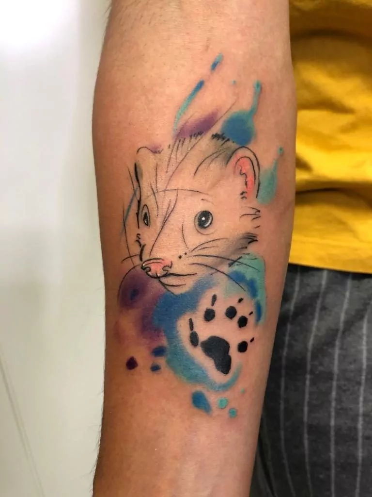 Tatuaje estilo watercolor en el antebrazo