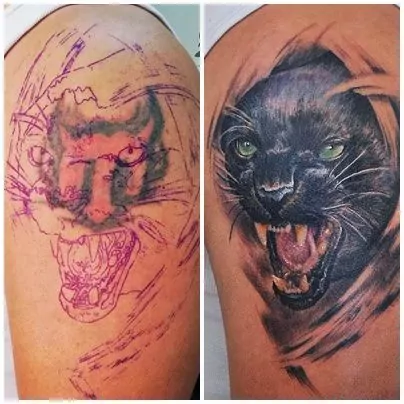 Tatuaje cover up pantera estilo realismo en el brazo