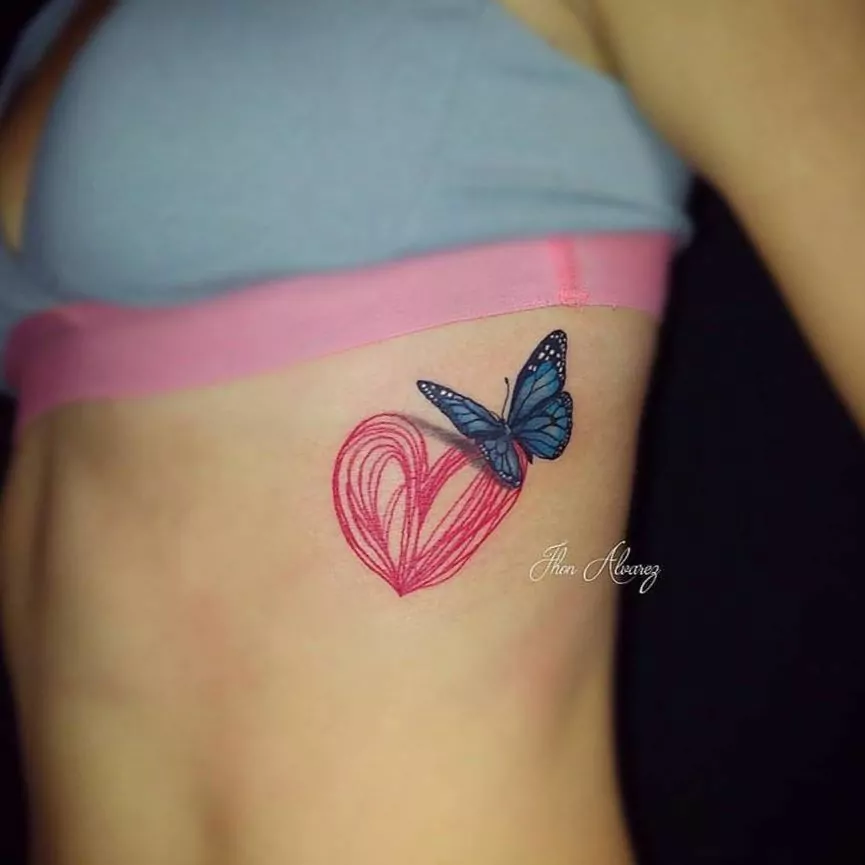 tatuaje mariposa y corazon